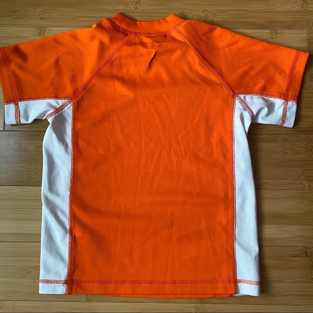 ZeroXposur Orange Rash Guard Size Medium (5/6)